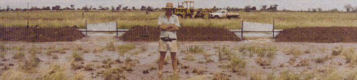 Water gates open, one man in flow